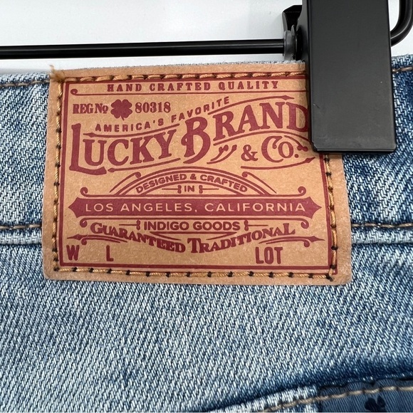 Lucky Brand Lucky Pins High Rise Multi Pom Pom Whiskered Light Wash Jean Shorts - Picture 9 of 12